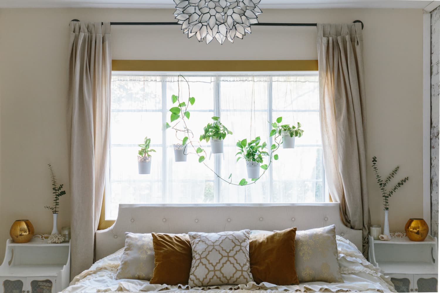 Window behind headboard top